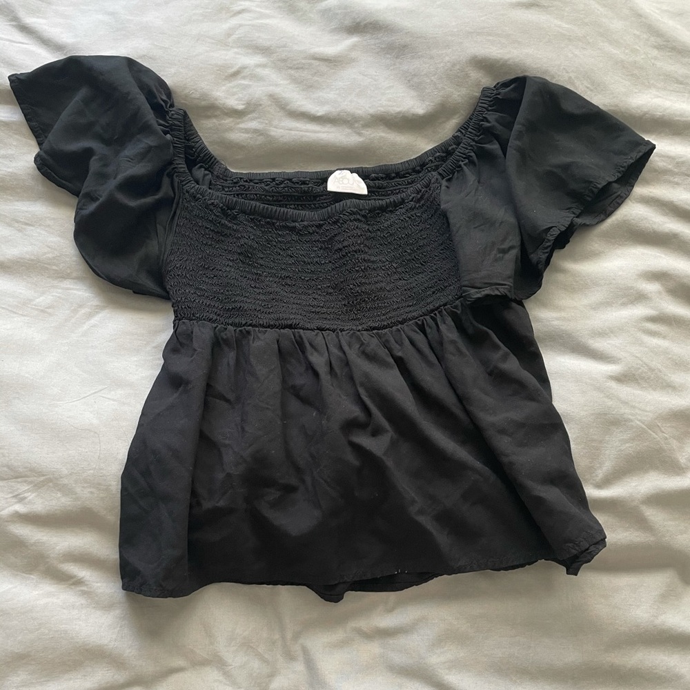 Cutest black ruffle shirt!